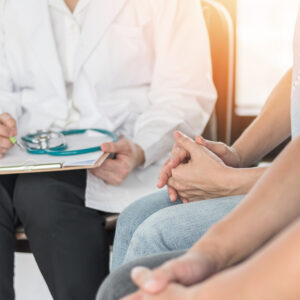 Couple having a discussion with the doctor