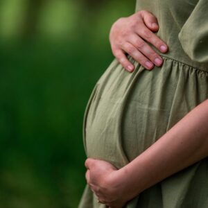 lady holding her baby bump